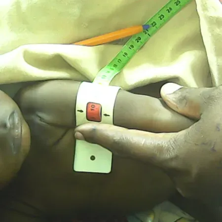 Arm circumference measurement in progress